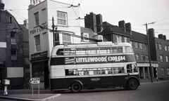 Trolleybus passing Hastings Wall flats 1959